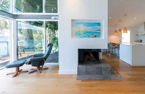 Scotland Island House | Elegant Oasis: Waterfront Retreat with Private Jetty