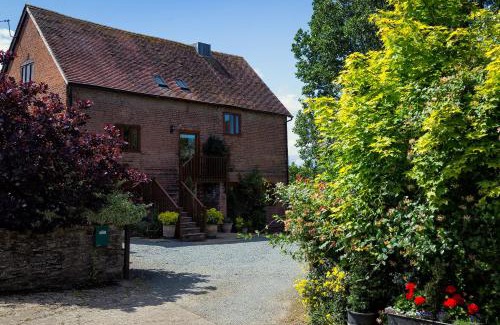 Bromyard Apartment | Discover The Oast House: Farm Stay with Pet-Friendly Comfort