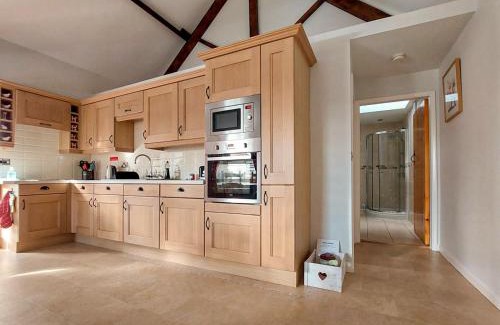 Driffield House | Discover The Old Barn: Family & Pet Friendly Retreat