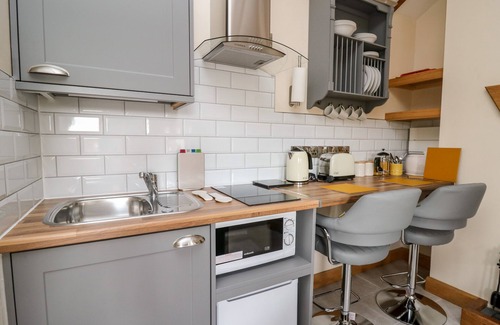Tirabad Cottage | Romantic Retreat at The Old Cobblers Shop with Hot Tub