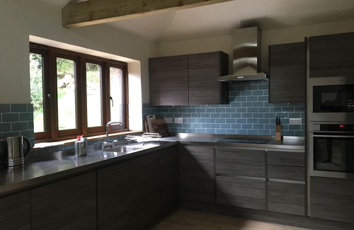 Chilworth House | Explore The Old Dairy: Cozy 2-Bedroom Barn Retreat