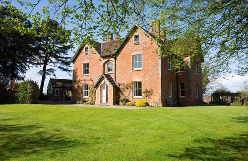 Oldbury-on-Severn House | Relax at The Old Rectory with Pool and Family Amenities