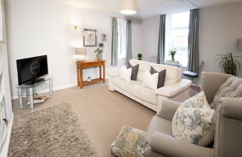 Lytham St. Anne's Apartment | The Old School House: Oceanfront Retreat with Family Amenities