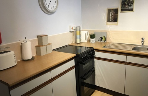 Lytham St. Anne's Apartment | The Old School House: Oceanfront Retreat with Family Amenities