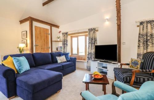 Luppitt House | Experience The Old Smithy: 4-Star Stay with Pool Access