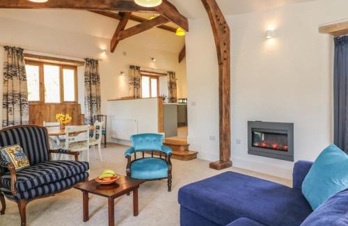 Luppitt House | Experience The Old Smithy: 4-Star Stay with Pool Access