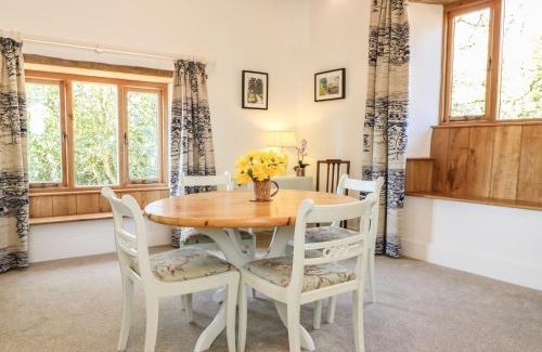 Luppitt House | Experience The Old Smithy: 4-Star Stay with Pool Access