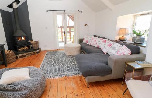 Newquay House | Discover The Old Stables: Pet-Friendly 4-Star Retreat