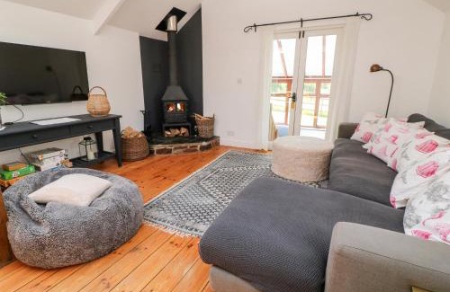 Newquay House | Discover The Old Stables: Pet-Friendly 4-Star Retreat