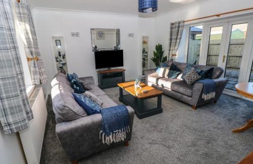 Draethen House | Pet-Friendly Retreat at The Old Well Bungalow, Ty Mawr Farm