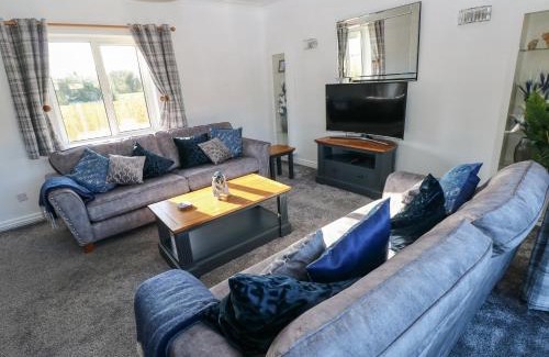 Draethen House | Pet-Friendly Retreat at The Old Well Bungalow, Ty Mawr Farm