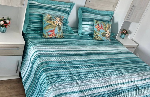 Mirim Apartment | Beachfront Escape with Gourmet Balcony and Family Amenities