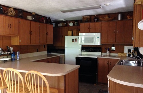 Jonesborough Cabin | Tranquil Riverfront Cabin with Pool & Pet-Friendly Amenities