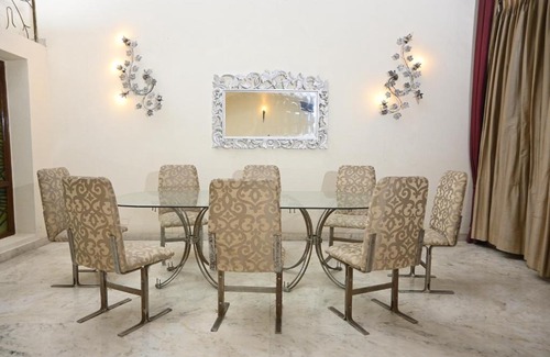 Chhatarpur House | Discover The Own Stay: Family-Friendly with Hot Tub Access