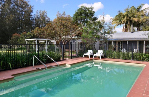 Broughton Vale House | Experience The Paddock: A Modern Coastal Barn Retreat