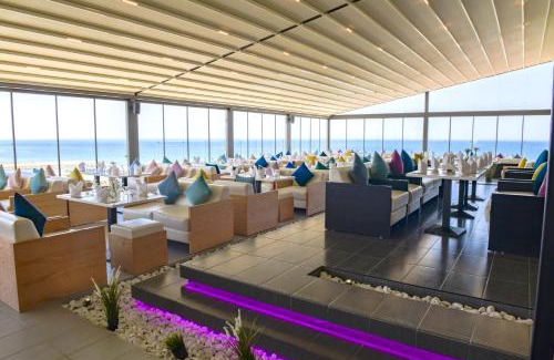 Salwa Resort | Experience The Palms Beach Hotel & Spa: Oceanfront Serenity