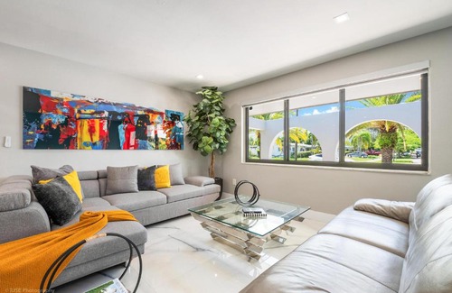 Cutler Bay House | Experience The Palms: Poolside Fun and Foosball Delight