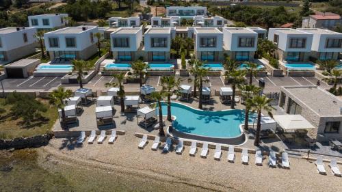 Kraj Villa | Oceanfront Getaway at The Palms Resort - Guest Rated 9.8
