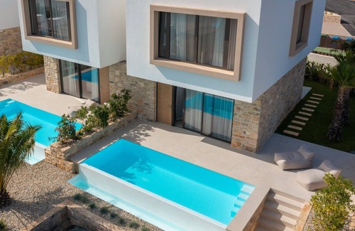 Tkon Villa | Pet-Friendly Oceanfront Retreat at The Palms Resort
