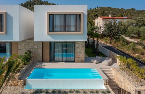 Tkon Villa | Pet-Friendly Oceanfront Retreat at The Palms Resort