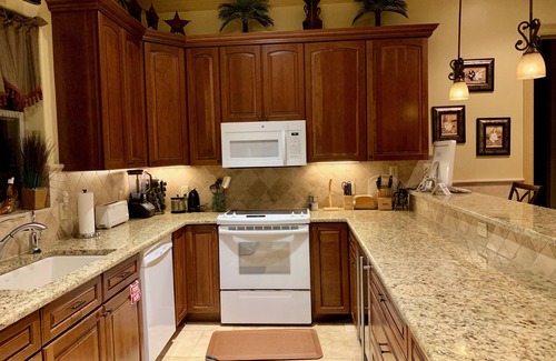 Comanche Trail House | Experience The Palms: Waterfront Retreat with Spa & Hot Tub