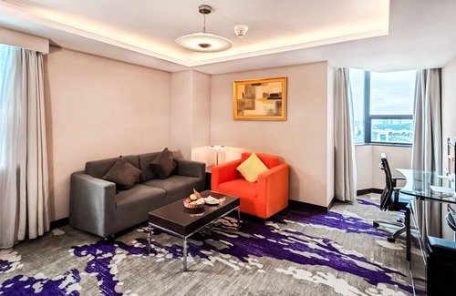 Futian Hotel | Discover The Pavilion Century Tower: 4-Star Comfort & Pool