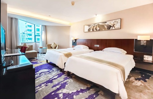 Futian Hotel | Discover The Pavilion Century Tower: 4-Star Comfort & Pool