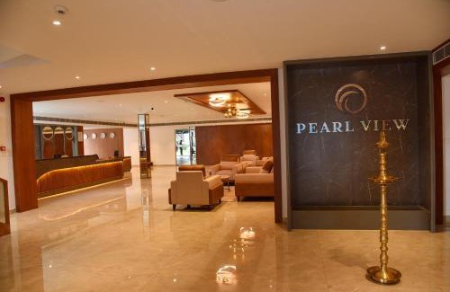 Kannur District Hotel | Discover The Pearl View Hotel: Poolside Relaxation Awaits