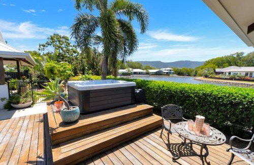 Trinity Beach House | The Peony Isle - Luxe Lakeside Haven with Pool & Spa