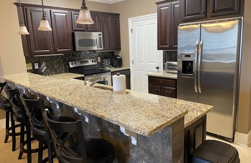Auburn - Opelika Condo | Ultimate Game Day Condo with Hot Tub & Family Amenities