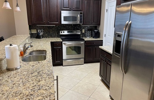 Auburn - Opelika Condo | Ultimate Game Day Condo with Hot Tub & Family Amenities
