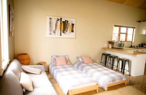 Otane Cottage | Modern Loft at The Phoenix on Miller with Ocean Views