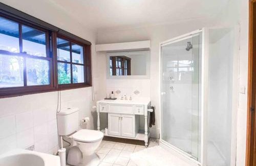 Bywong House | Cozy Pine Tree Cottage Near Canberra with Fireplace & Breakfast