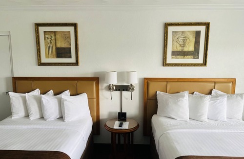 Owosso Hotel | Eco-Friendly Stay at The Pines Country Inn - 9.2/10 Rated