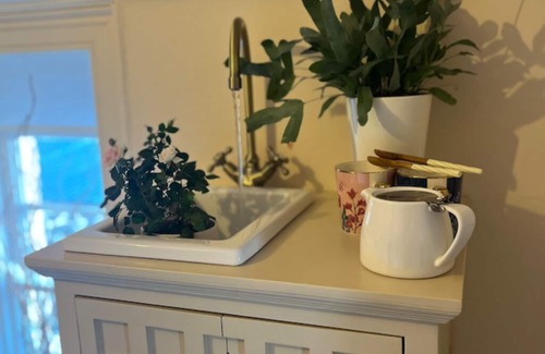 Carrickfergus Cottage | Enchanting Pink Cottage Suite with Ocean View & Secret Garden