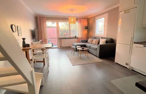 Akalla House | Charming Pink Cottage in Stockholm with Family-Friendly Amenities