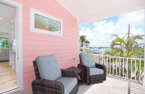 Fort Myers Beach House | The Pink Pearl: Chic beach house with Gulf access & sunset views—ideal Fort Myers Beach escape!