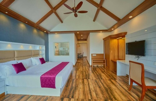 Suryanelli Hotel | Discover The Planet Munnar: Family-Friendly with Pool Access