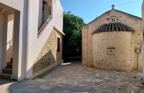Gortyna Apartment | Top-Rated Family Retreat at Platano Village Residence