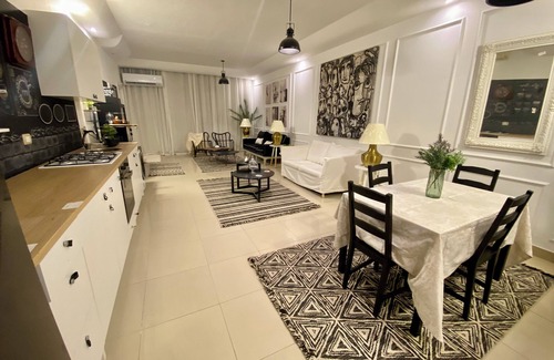 Al Haram Apartment | Vibrant Apartment in the Heart of a Colorful Street Scene