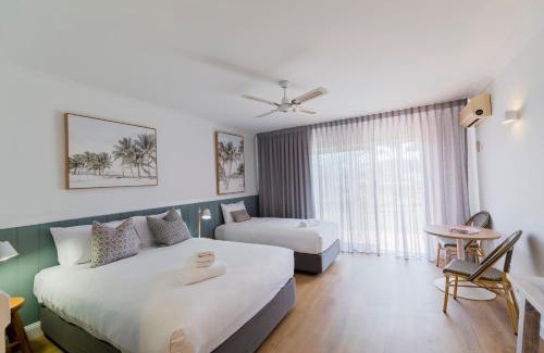 Forresters Beach Hotel | Relax at The Quarters: Oceanfront Retreat with Pool & Dining