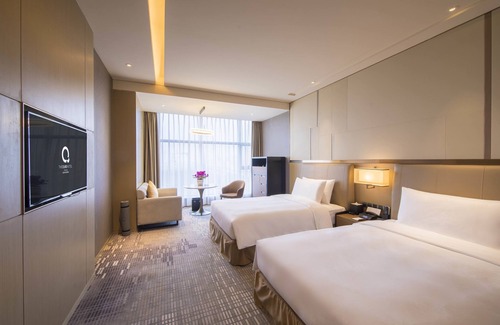 Fangcheng Hotel | Discover The Qube Hotel Xiangyang: Pool, Spa & Family-Friendly