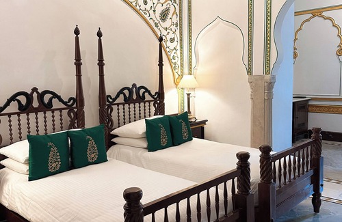 Amer Fort Road Hotel | Experience Elegance at The Raj Palace - 5-Star Retreat