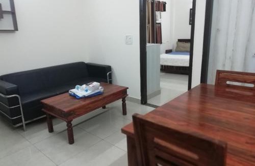 Sainik Farm House | Comfortable 2BHK Serviced Apartment at The Raveesh E24