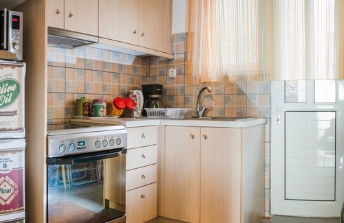 Kinosargous Apartment | Divine Apartment Steps from Acropolis with Family Amenities