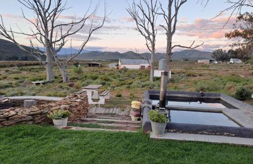 McGregor Villa | Experience The Red Caboose Train Carriage with Pool & Hot Tub
