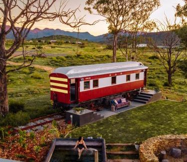 McGregor Villa | Experience The Red Caboose Train Carriage with Pool & Hot Tub