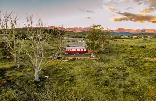 McGregor Villa | Experience The Red Caboose Train Carriage with Pool & Hot Tub
