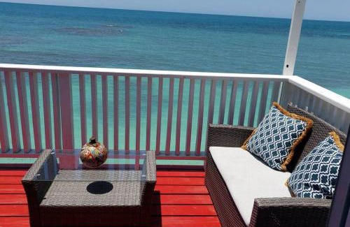 Pedernales House | Cozy Red Door Beach House with Oceanfront Views in Buye