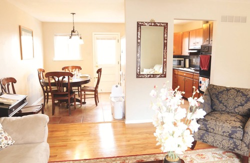 Maryland Heights House | Cozy Red Door Retreat: Exceptional Stay with Pool & Kitchen